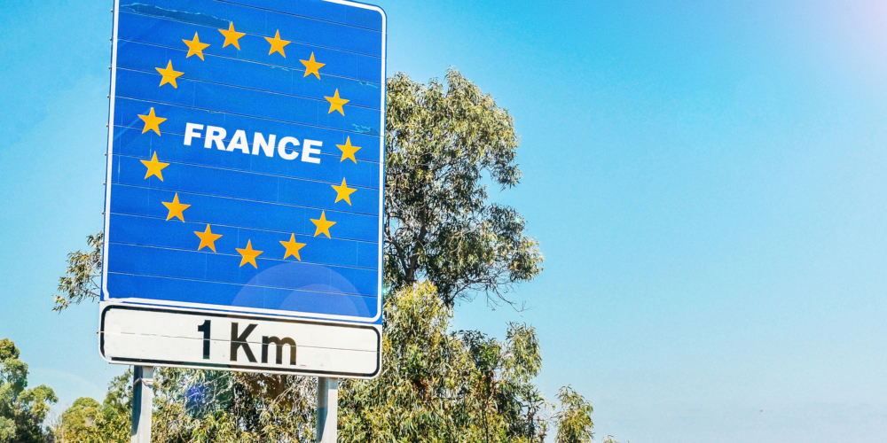 Road sign on the border of France as part of an European Union member state