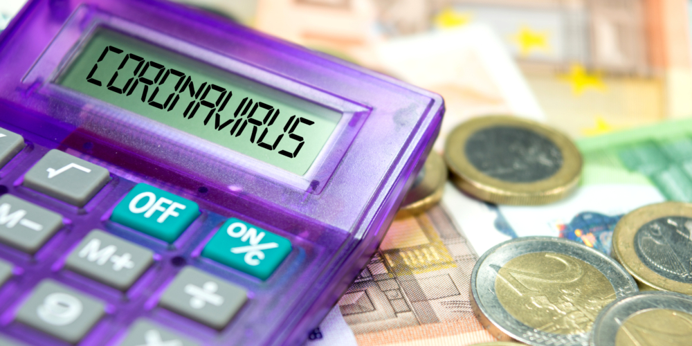 Calculator, Euro banknotes and coronavirus in Europe –