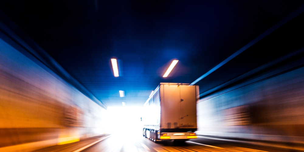 Transports Truck Driving in Tunnel