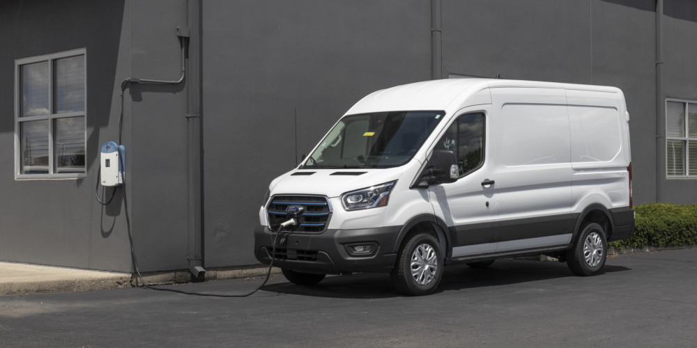 Ford E-Transit Cargo Van at a dealership. The Ford E-Transit has an electric motor providing 266hp. C rijbewijs