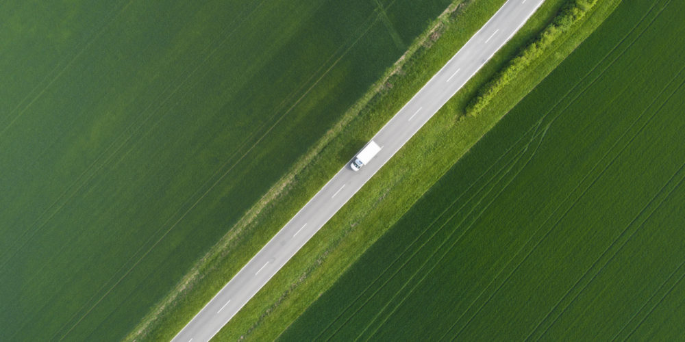 Road through agricultural area – aerial view